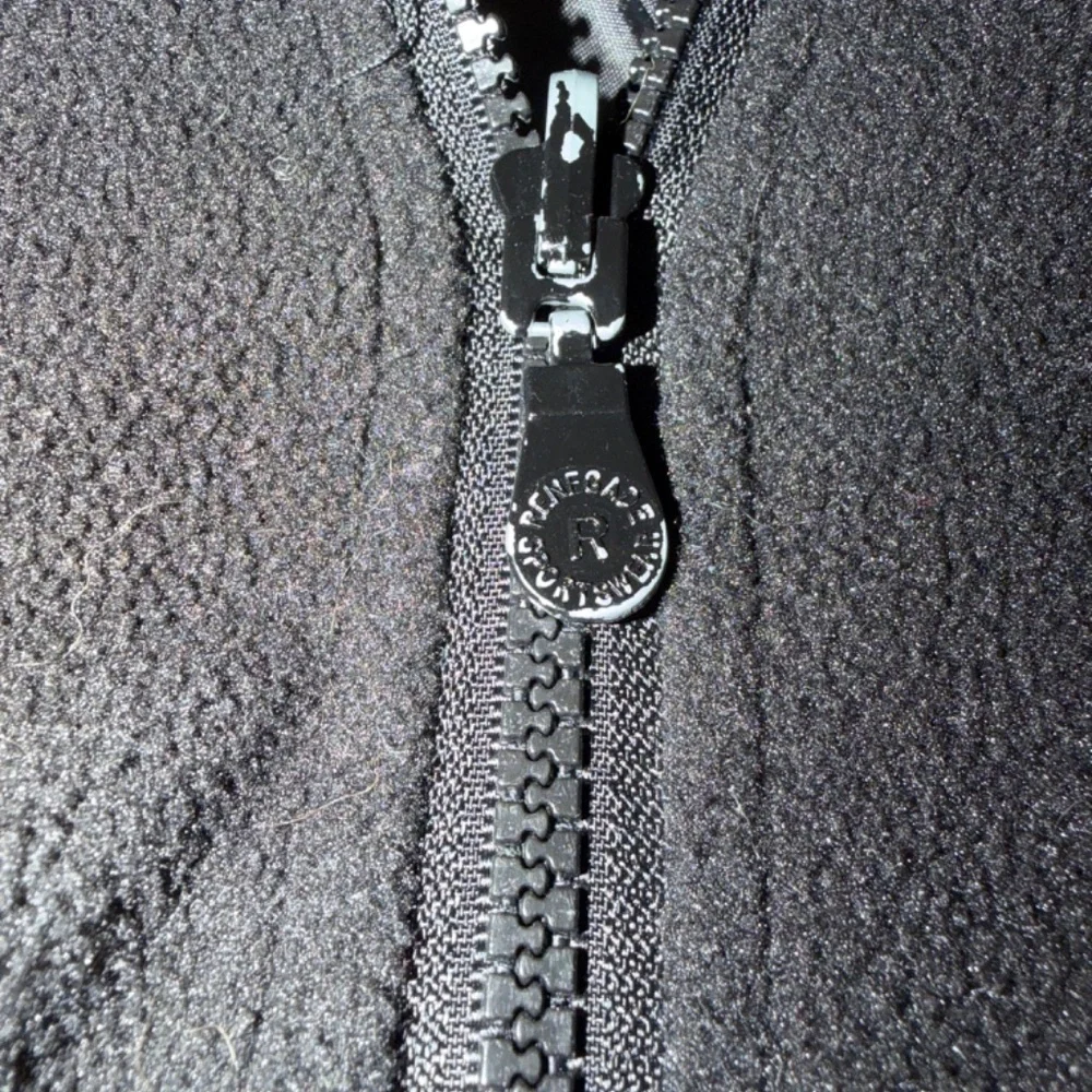 Coach’s jacket with zip out hood